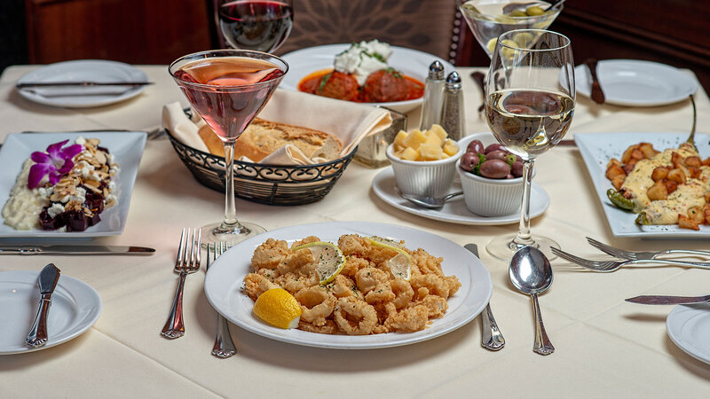 Table Setting Featuring Fried Calimari – Red Beets – Grandma’s Meatballs & Stuffed Long Hots as Appetizers