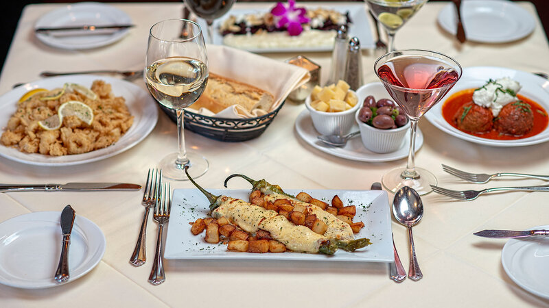 Table Setting Featuring Stuffed Long Hots – Fried Calimari - Red Beets – Grandma’s Meatballs as Appetizers