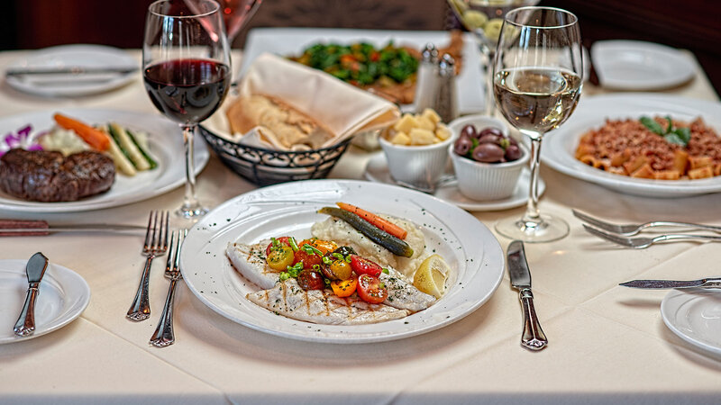 Table Setting Featuring Bronzino Filet – Filet Mignon - Rigatoni